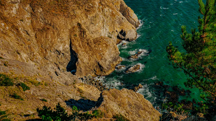 Golden cliffs and turquoise sea on the California coast
