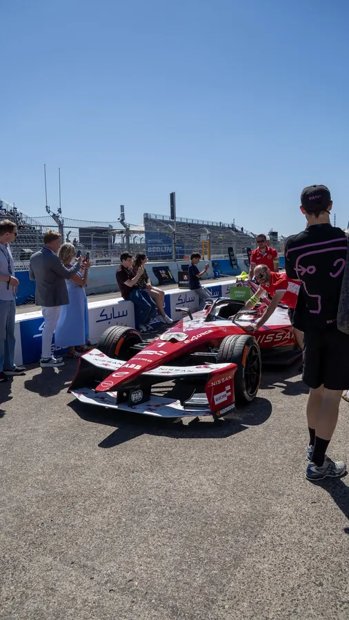 Formula E car with its crew in the pit lane, Berlin