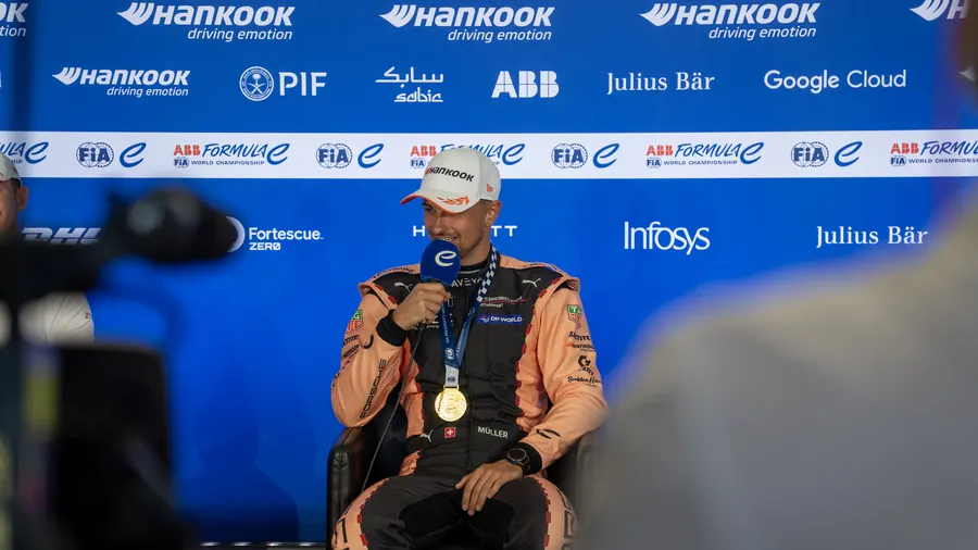 Formula E race winner with medal at the press conference, Berlin