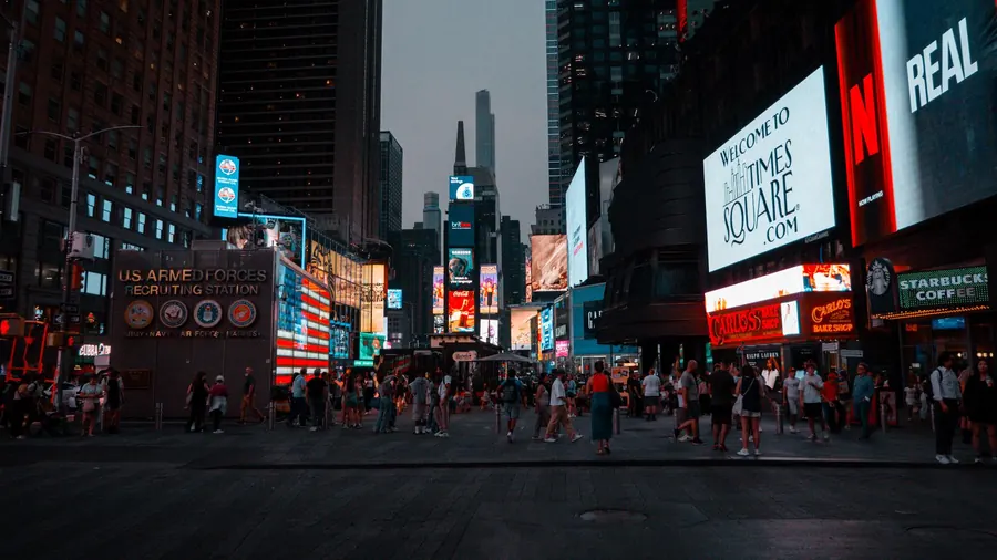 Times Square at dusk with neon billboards, New York